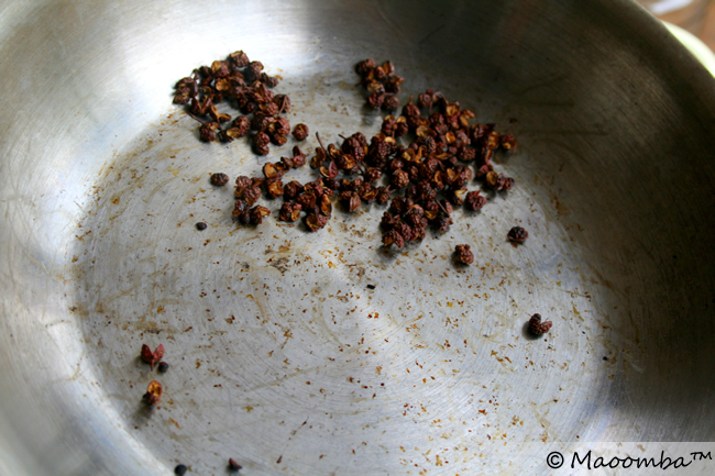 Pan toast the Sichuan pepper to heighten their flavor.