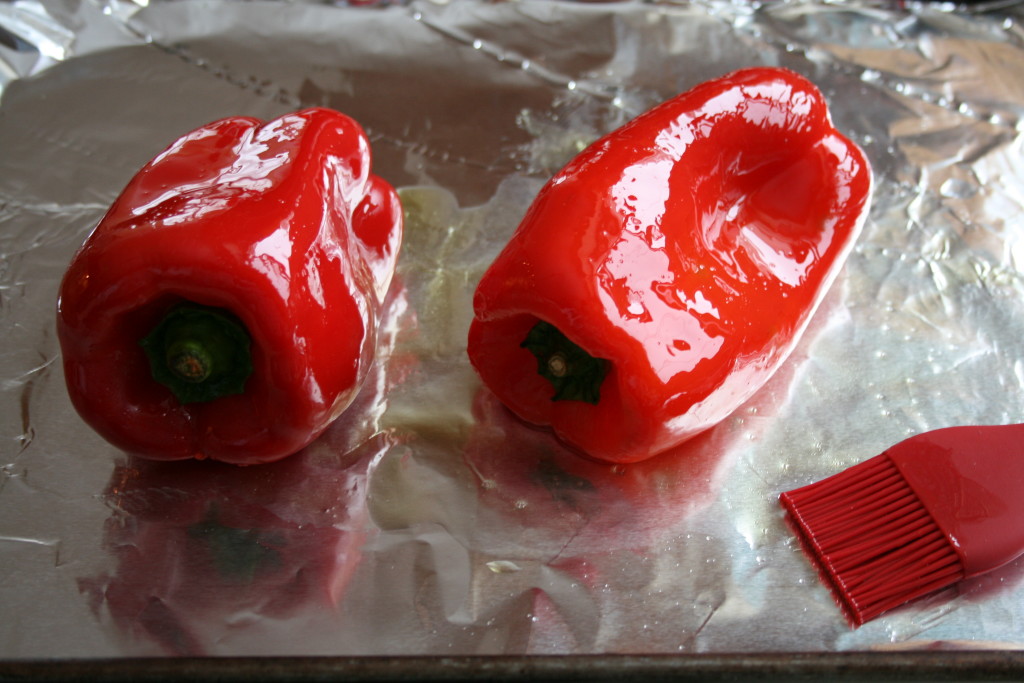 Lightly coat peppers in olive oil. 