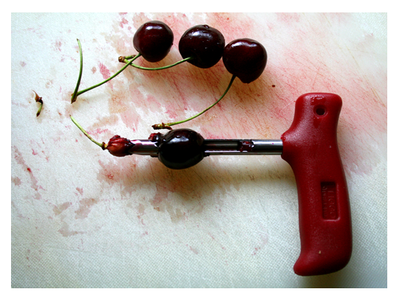 cherries being pitted