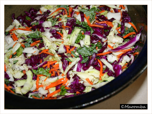 Mixing the sauerkraut ingredients - kale, cabbage, carrots...